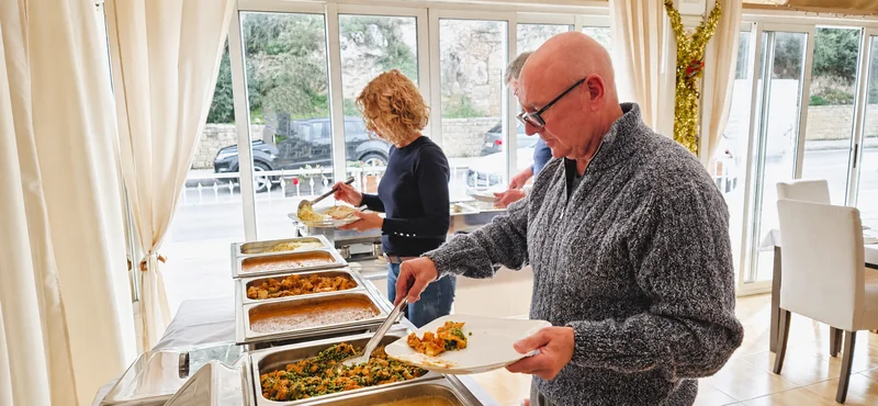 Guests serving themselves at Saffron’s Sunday curry buffet